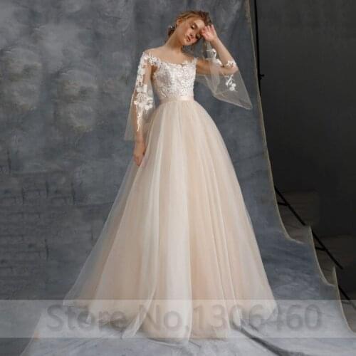 Champagne A Line Tulle Floor Length Wedding Dress Long Sleeve Sheer O Neck Appliques Lace Bride Gown Robe de mariée Button Back