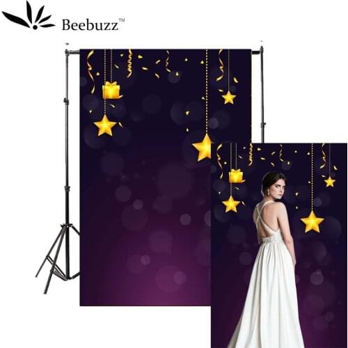 Stars and party ribbons on purple background photography studio photophone Birthday party celebration photo shoot