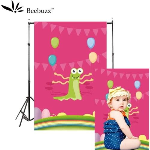 Pink cartoon sticker background background photography studio photophone Green monster child photo shoot