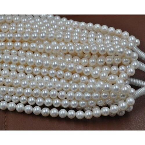 AA+ 8.5-9.5mm round white freshwater cultured pearl loose string