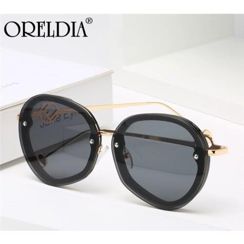 2021 New Round Rimless Sunglasses Ladies Fashion Irregular Metal Temple Glasses Gradient Color Lens Mens Sunglasses Hot UV400