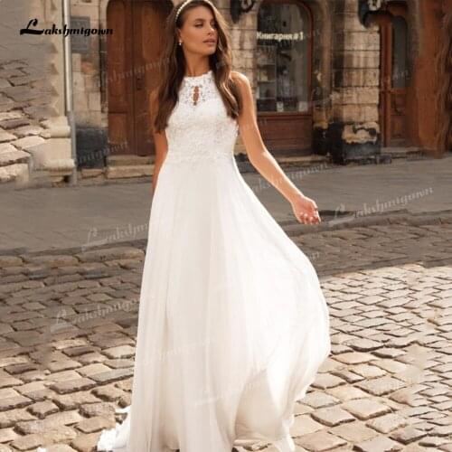 Charming Lace A-Line Wedding Dresses Halter Neck Sleeveless Off The Shoulder Open Back Tassel Appliques Mid-Calf Bride Gowns