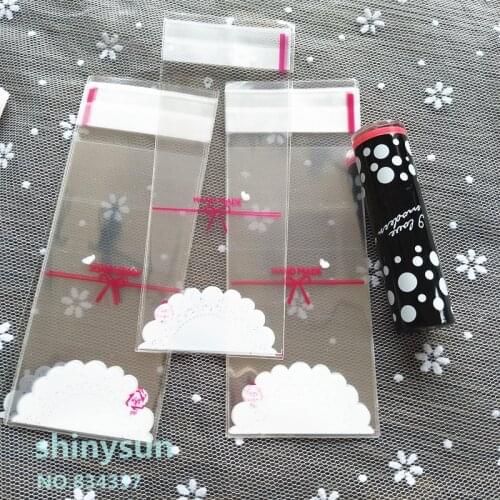 100pcs/lot Clear bowknot plastic cookie packaging 5x10cm cupcake wrapper bags self adhesive bags