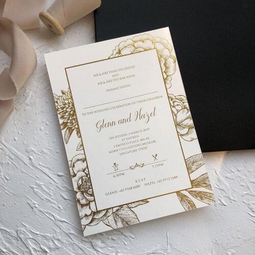Floral gold foil wedding invitations