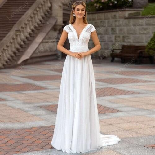 Lace Beach Wedding Dresses 2021 A Line Lace Appliques Bridal Gown Cap Sleeves V Neck Vestidos De Novia Boho Bride Dresses