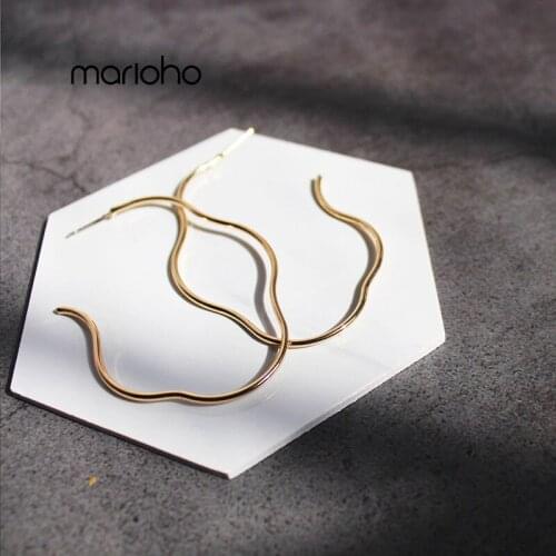 Womens Fashion Gold Colors Abstract Geometric Lines Arc Shaped Drop Earrings Metal Hollow Earrings Simple Jewelry Party