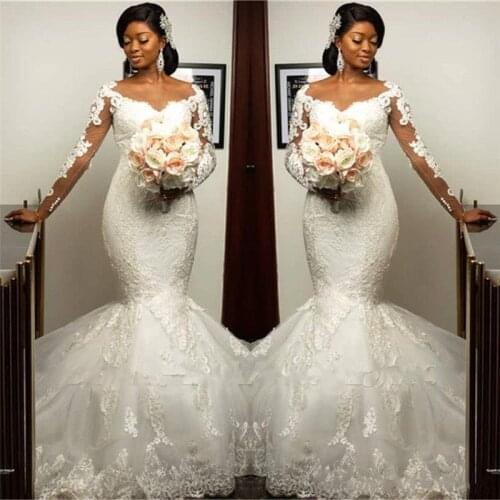 Illusion Long Sleeve Mermaid Wedding Dresses 2022 Jewel Neck Lace Applique Trumpet African Bridal Gown