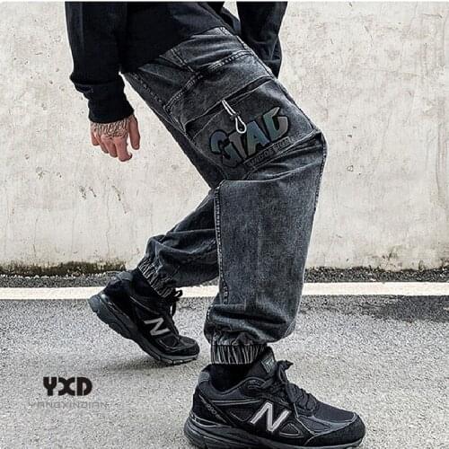 Mens Jeans Man Streetwear Hip Hop Loose Retro Carrot Pants For Men Reflective Letters Pocket Cargo Pants Male Harajuku Trousers
