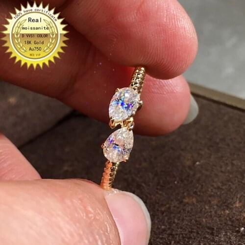 Use 18k white gold and pear shape 2ct moisasntie DVVS1 a set of ring