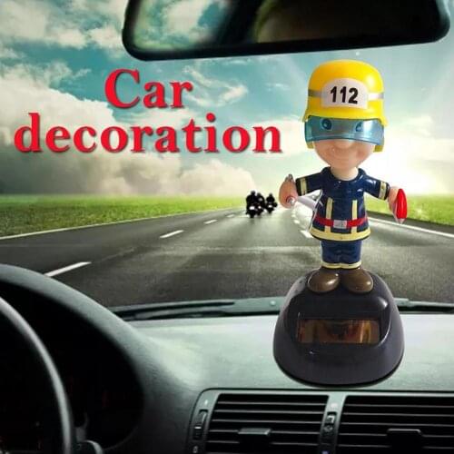 Lovely Firemen Solar Automatic Swing Head Car Interior Dashboard Ornament Gift