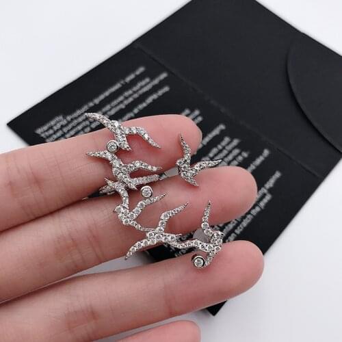 Cherrykeke New-Fashion Asymmetry Steel Crystal Rhinestone Birds Earrings Ear Clip Stud Earrings Silver Color Swallow Bronics