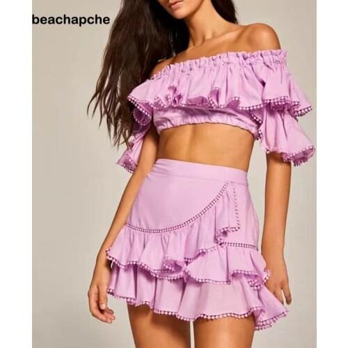 Beachapche 2021 Summer New Womens White Folded Wooden Ears Hollow One-line Collar Waist Short Top + Skirt Set