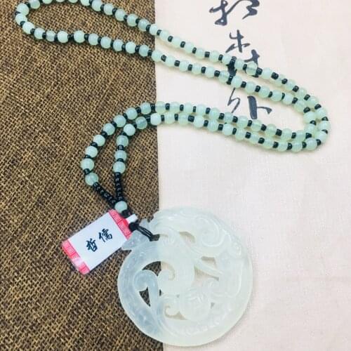 Zheru natural nephrite carved ice through the hollow retro amulet dragon pendant with Yuzhu necklace men and women sweater chain