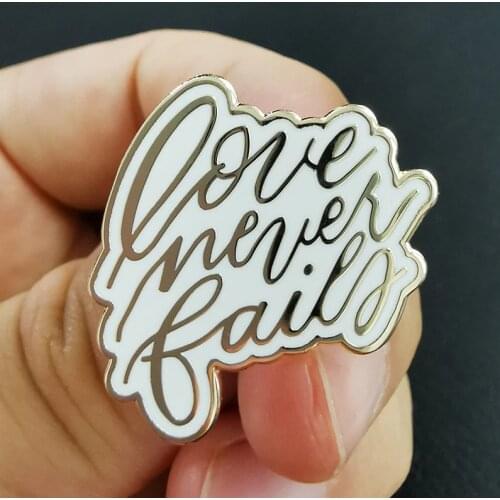 Love Never Fails Gold and White Lapel Pin Christian Quote Badge lovely daily reminder of encouragement