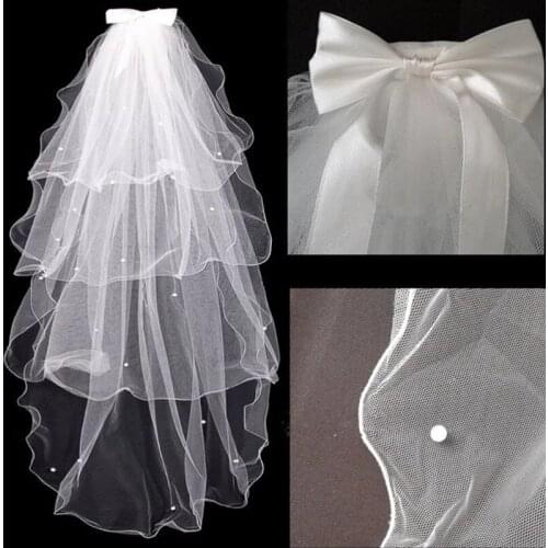 4 Tier Layered Womens Wedding Veil Imitation Pearl Handmade Beaded Ribbon Bowknot Decor Agaric Wavy Trim Bridal Veil With Comb