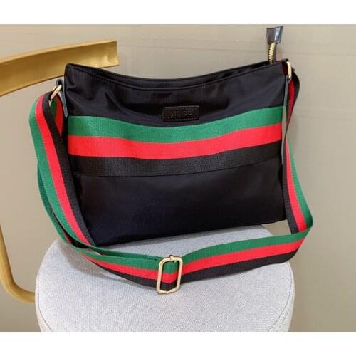 2021 new messenger bag striped clutch wrist bag European and American fashion womens bag shoulder bag