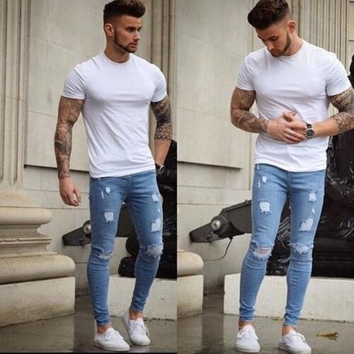 Men casual jeans spring / summer new fashion washed distressed hole elastic slim jeans men solid color pencil pants denim pants
