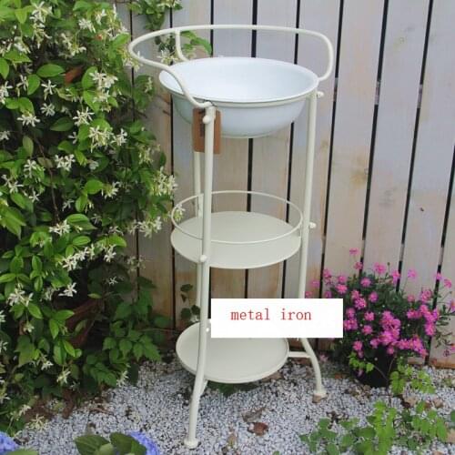 Vintage retro white enamel basin and shelf