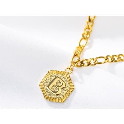 White box with a-z letter anklet