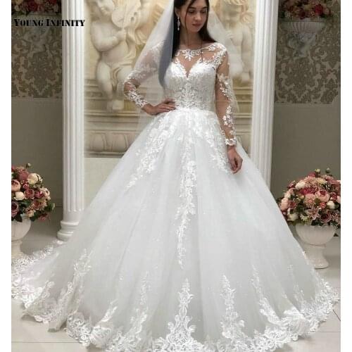Elegant Ball Gown Wedding Dresses 2021 Long Sleeves Bridal Gown Lace Up Back Scoop Chapel Train Applique White Plus Size Bride