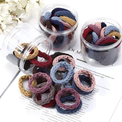 20 pieces / box High elastic jointless head rope rubber band Jacquard Color black headdress female fashion personality sweet