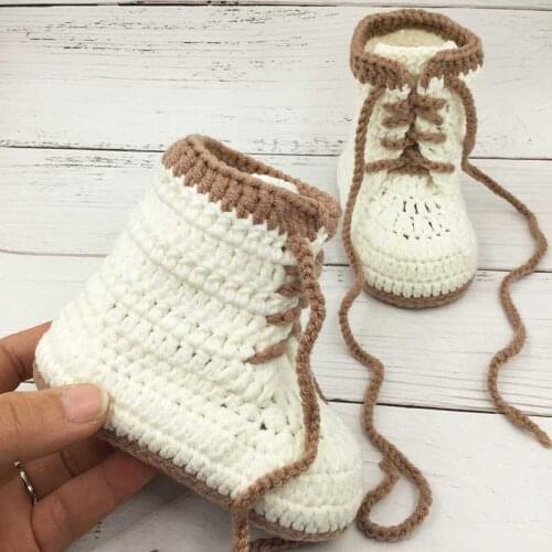 Hand-made boots for baby toddlers. boys and babies. Hand-knittedshoes Handmade wool Crochet knitted baby shoes, sandals garden s