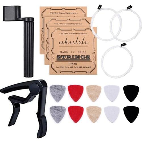 Guitar/Ukulele Tool Kit 10pcs Soft Felt Ukulele Picks(Random Color) 3 Set of Strings(4pcs/Set) 1pc Clip-on Capo 1pcString Winder