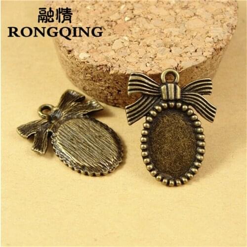 RONGQING 14*10MM 50pcs/lot Bow Retro Tray necklace DIY Accessories Wholesale Craft