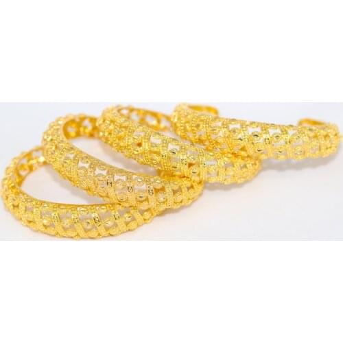 Xinhuias Golden Bracelets