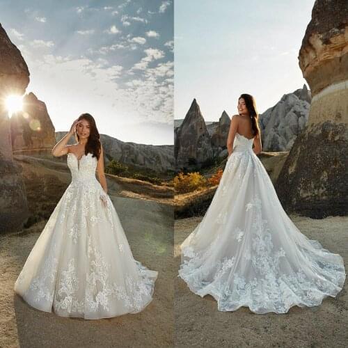 2021 Wedding Dresses Sexy Sweetheart Applique Lace A-Line Bridal Gowns Custom Made Open Back Sweep Train Wedding Dress