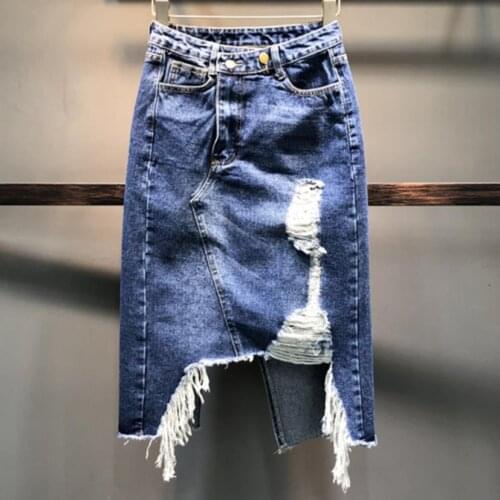 New fashion irregular denim skirt women high waist A -line tassel hole package hip jeans skirt