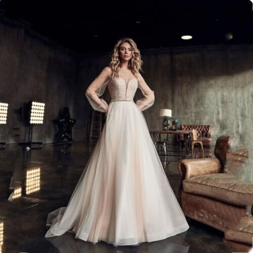Wedding Dress A-Line Long Sleeve Pearls Zipper Puff Sleeve Sweep Train Robe De Mariee Custom Made Sweetheart Champagne Color