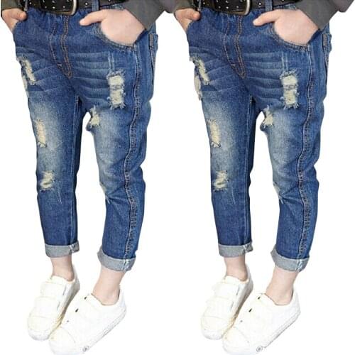 2020 autumn new Korean version of the hole childrens denim trousers boys and girls fashion wild tide fan jeans