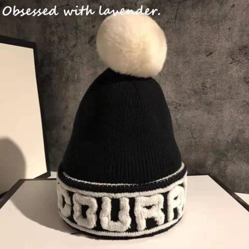 Obsessed with lavender.Hat female autumn/winter letter wool hat black knit hat Korean Japanese cute tide brand ball to keep warm