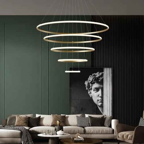 Living room chandelier postmodern simple luxury duplex staircase hall lamp copper ring art engineering net red lamp