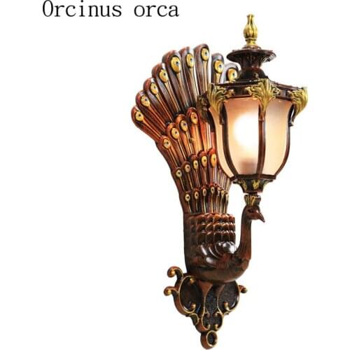 Creative luxurious peacock waterproof wall lamp courtyard living room corridor personality retro gold LED outdoor wall lamp