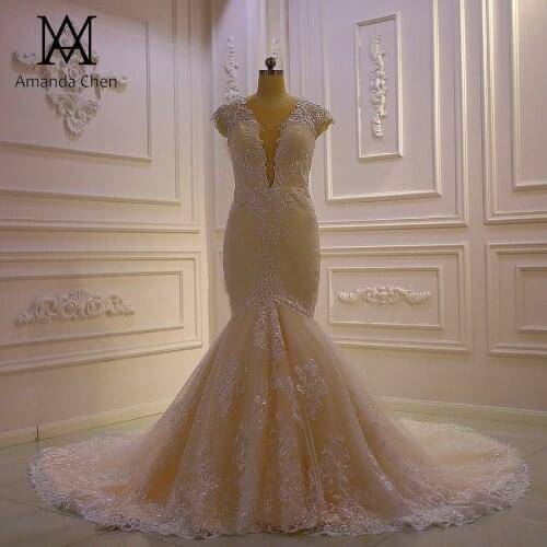 Robe mariee Cap Sleeve Lace Appliqued Low Cut Champagne Mermaid Wedding Dress Plus Size