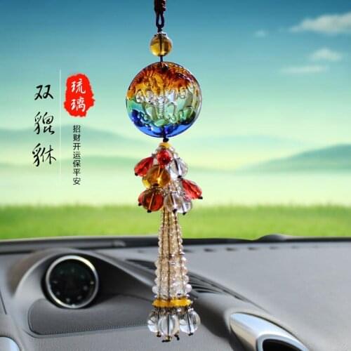 Glass car hanging car insurance covered