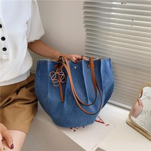 Purple spirit bird Women's Denim Bags