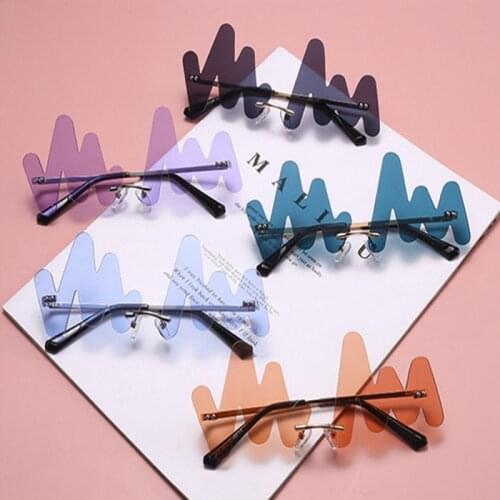 Personality Wave Rimless Sunglasses Women Brand Fashion Punk Sun Glasses Female Frameless Blue Curved Glasses UV400