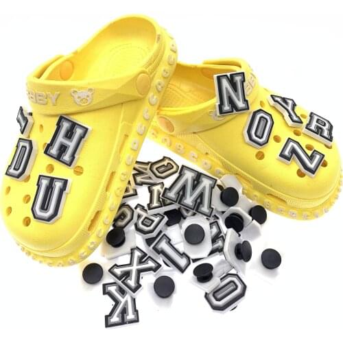 50PCS Wholesale Alphabet Soft Cartoon PVC Shoes Charms Garden Shoe Accessories New Letter Wristband Decoration Party Gifts