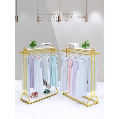 Nordic light luxury clothing store display rack gold floor type display rack