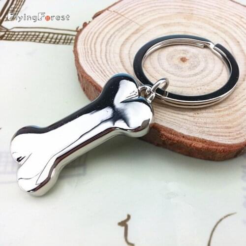 Wholesale fashion accessories pet bone pendant male car keyring dog keychain key chain laser Tag key gift