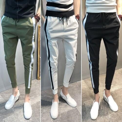 Wholesale 2021 Fashiion Drawstring boys Spirit guy pants mens slim Korean thin summer harem feet student beam sports pants