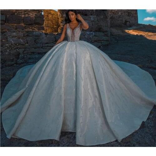 Glitter Crystal Ball Gown Wedding Dresses Sleeveless V Neck Sequins Custom Made Dubai Bridal Gowns Vestido De Noiva