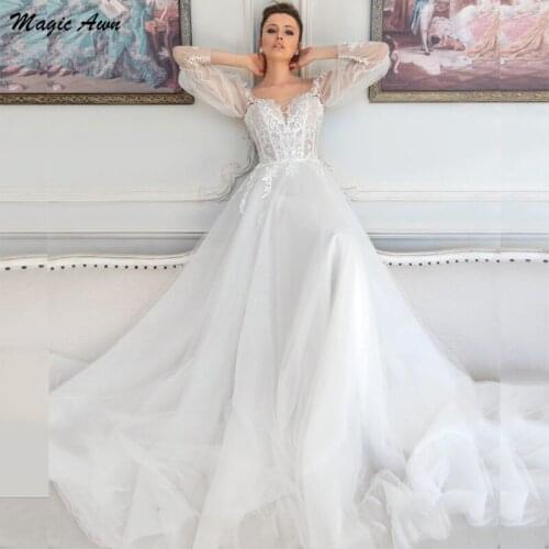 Magic Awn Modest Ivory Tulle Wedding Dresses Puffy Long Sleeves Lace Appliques Illusion Boho Princess Bridal Gowns Beach Vestido
