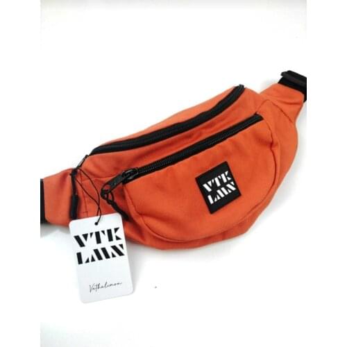 Orange shoulder and waist bag