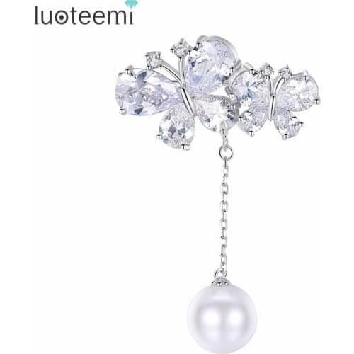 LUOTEEMI Long Line Shiny Flower Shape Copper Double Butterfly Micro Paved with Imitation Pearls Star Brooches For Women Party