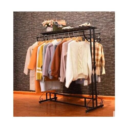 The clothing store shows Textile Gondola iron clothes rack with iron clothes rack floor-to-floor womens clothing store shelves