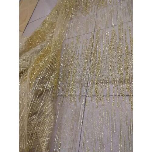Bright gold african glitter tulle fabric sparkly YG-524 glued glitter lace fabric for fashion show or wedding dress